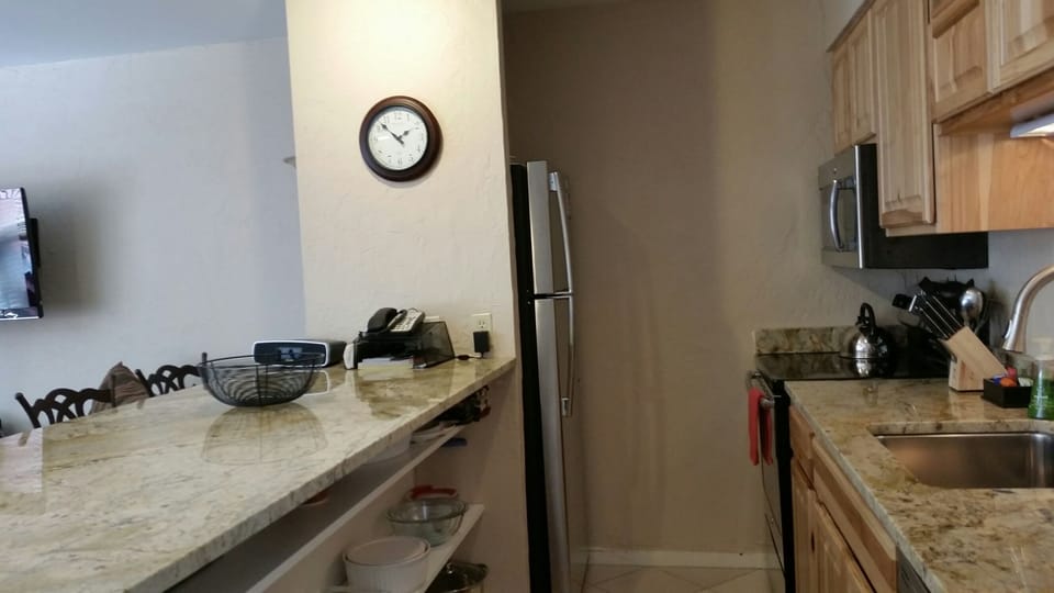 New Kitchen w/stainless steel appliances, ample cabinets & shelving; fully eqpd