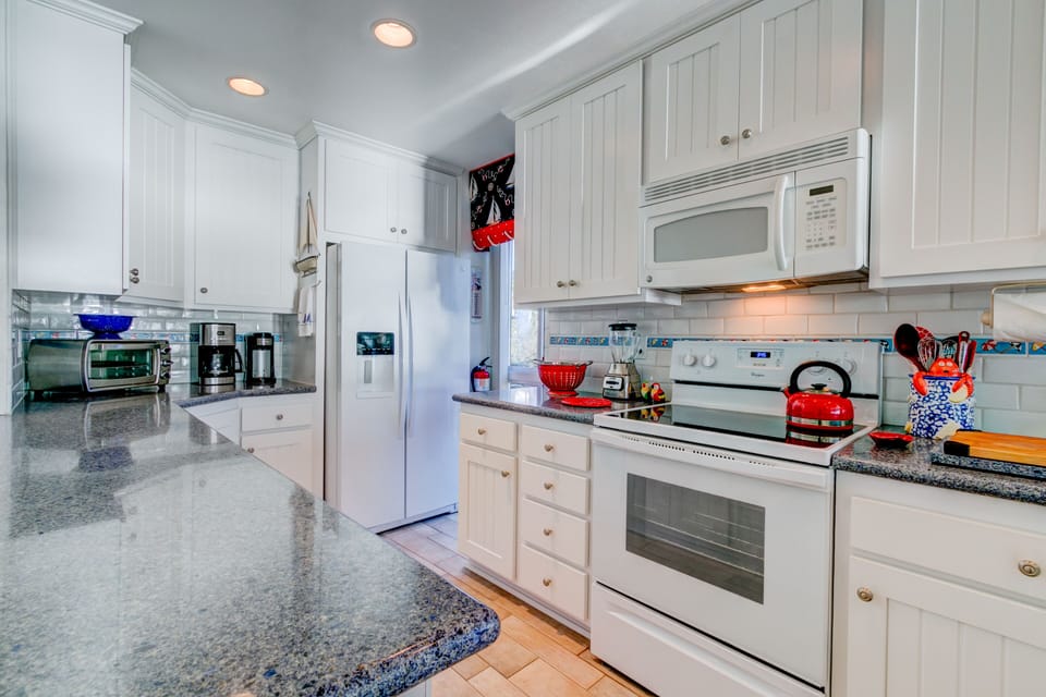 Kitchen is very well-stocked with everything you need to prepare a meal.