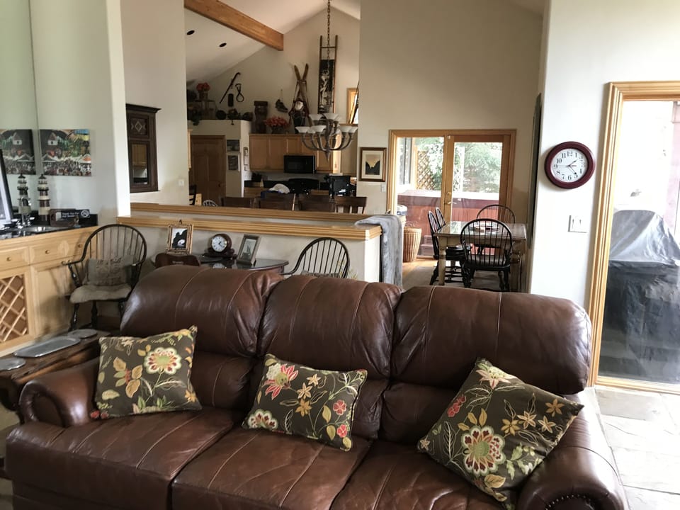 Open Layout, wet bar, easy access to deck tables/seats, private hot tub, grill 