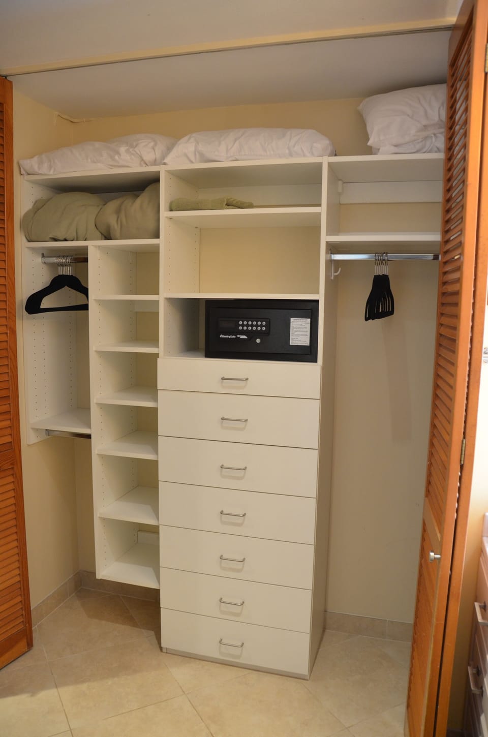 Beautiful closet with a safe for your use.