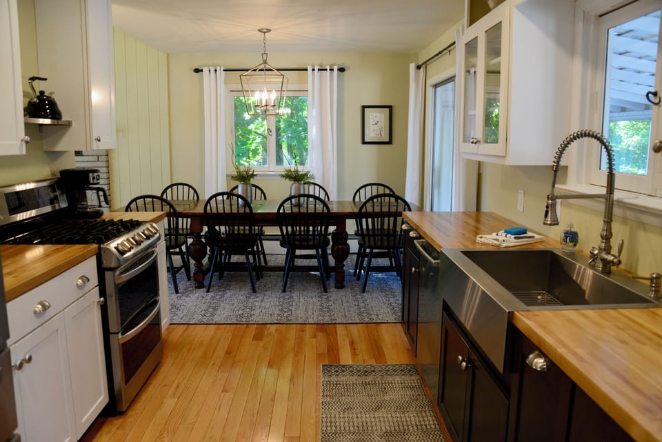 view of galley kitchen looking at dining room