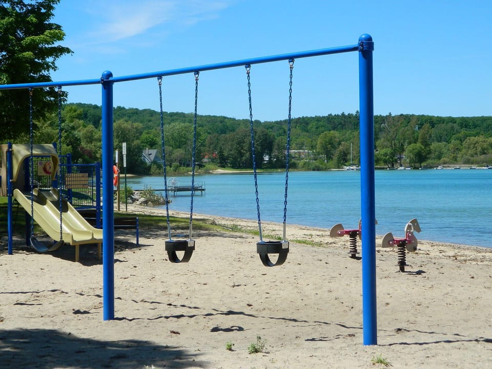 public park with sandy beach is steps away from the cottage