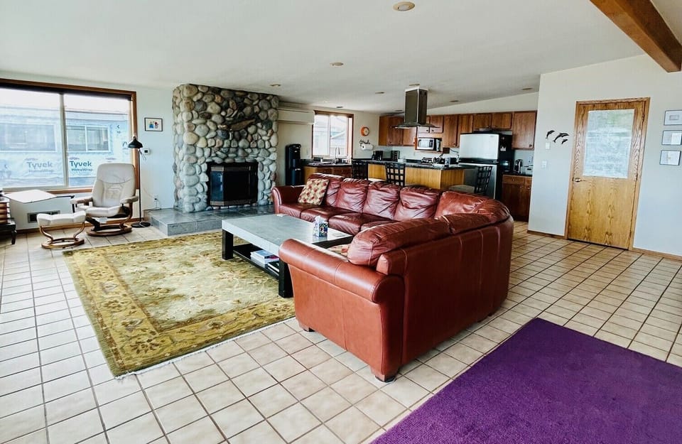 Kitchen shares great room, with ocean views. 