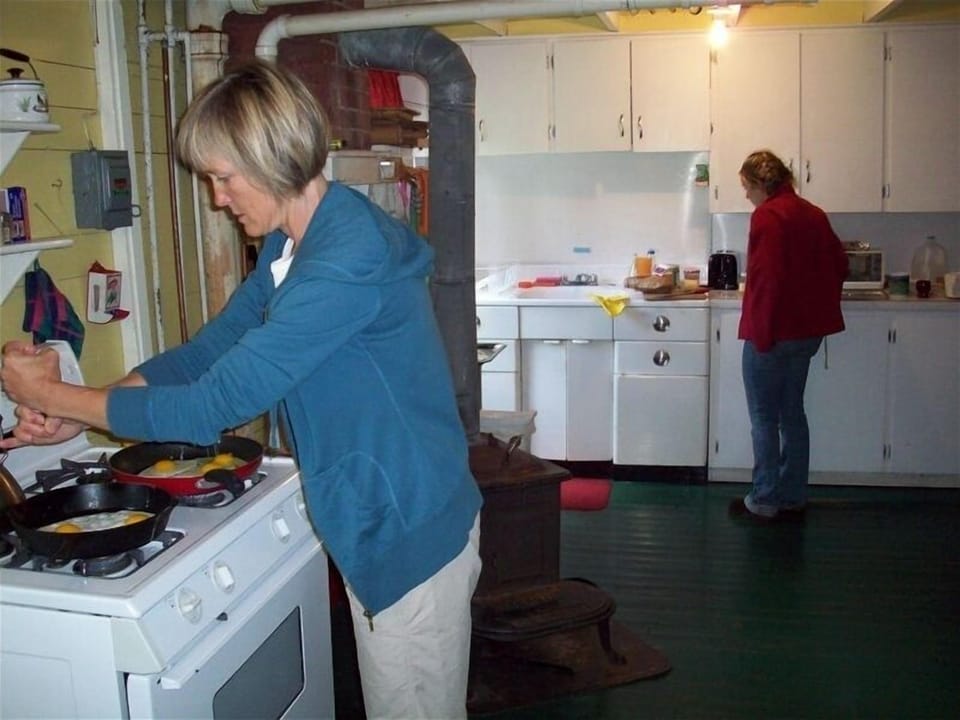 Oversized kitchen area includes two sinks (wet bar area) and plenty of prep area