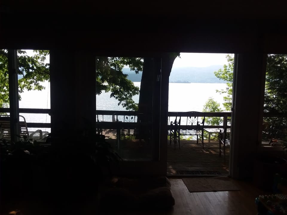 Sun Room Looking out onto Front Sitting Deck 