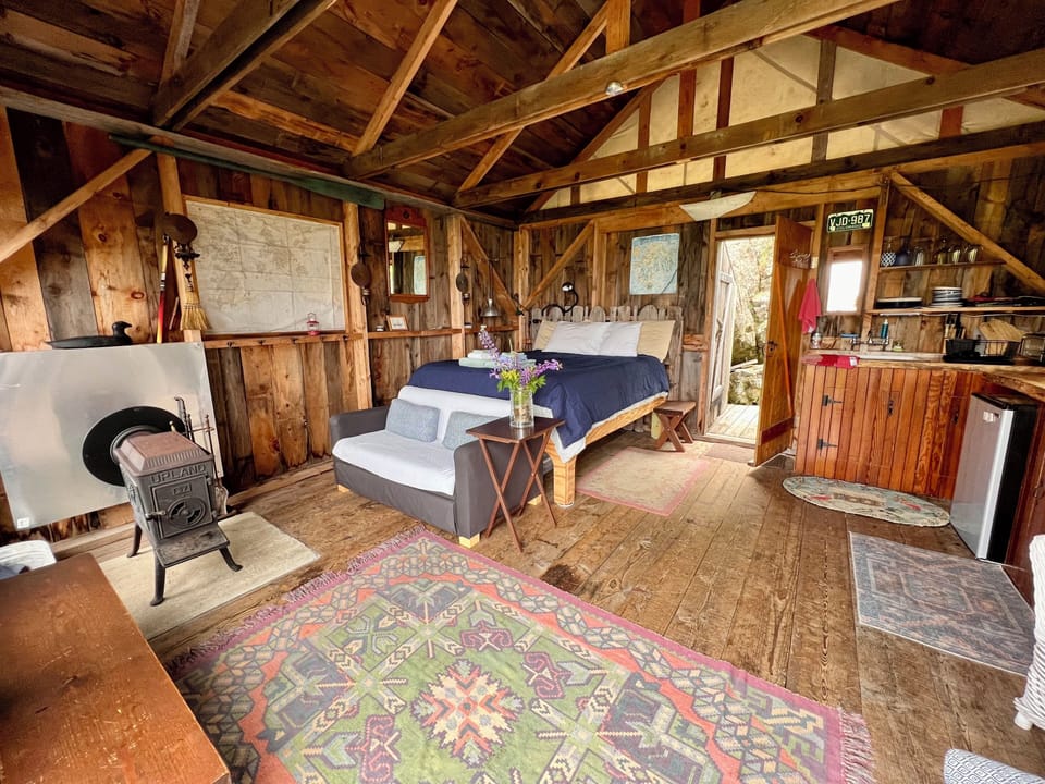 Interior of cabin with wood stove