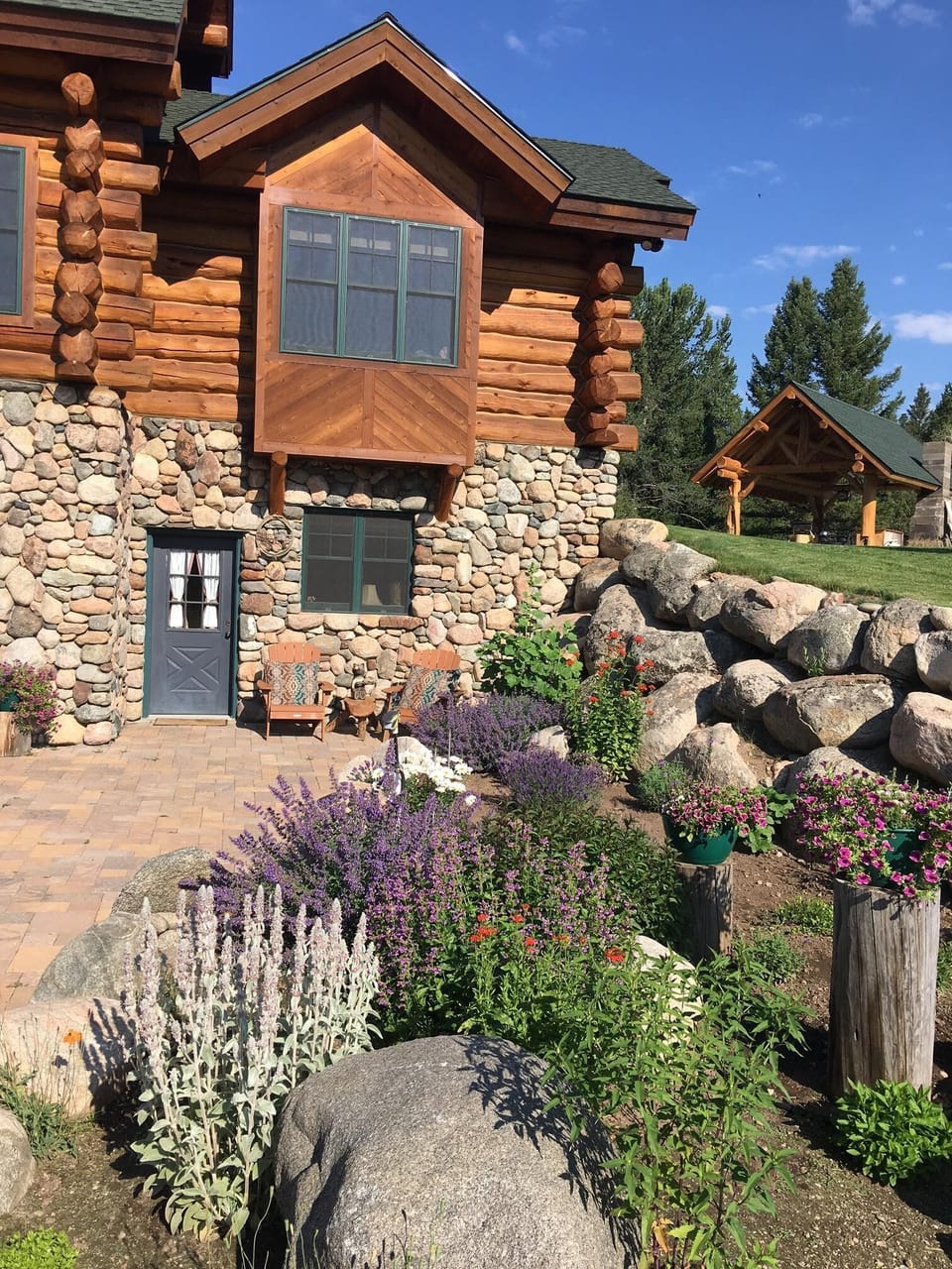 Garden View to Bunkhouse with Outdoor Kitchen in background