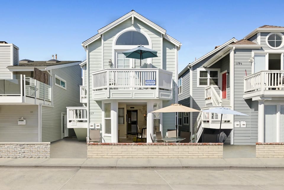 Street view of the entire ocean view duplex. This listing pertains to the downstairs 3 bd/2 ba unit only. The upper unit can also be rented when available.
                