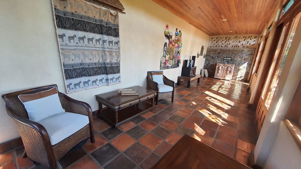 Downstairs relax room to have some drinks or use as meeting/ play room