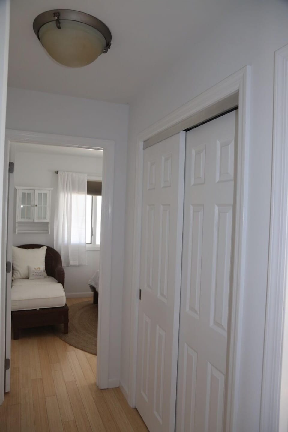 Downstairs hall looking into Queen Bedroom Two