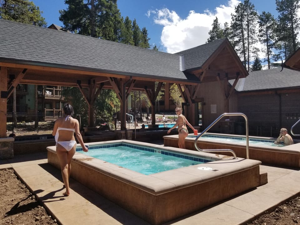 Heated outdoor pool and hot tub facility with 4 new hot tubs open ski and summer