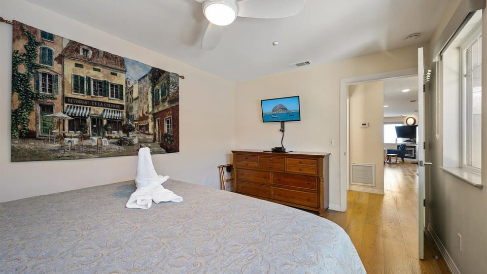 Flat screen tv and comfortable bed in the bedroom