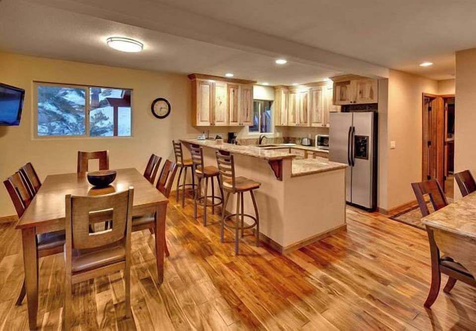View from front door entering kitchen. Note Costa Rican Walnut hardwood floors.