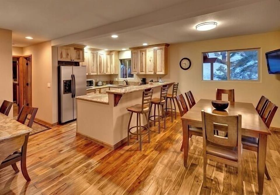 View from front door entering kitchen. Note Costa Rican Walnut hardwood floors.