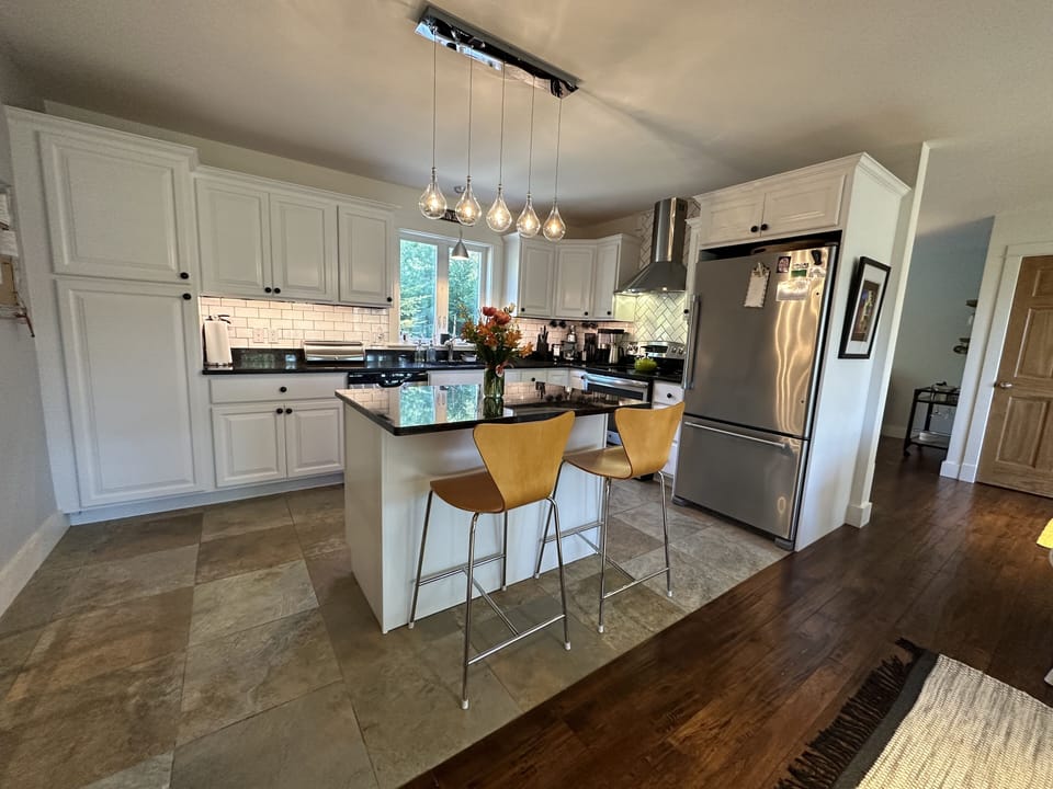 Kitchen with breakfast bar and everything to make your stay feel like home!