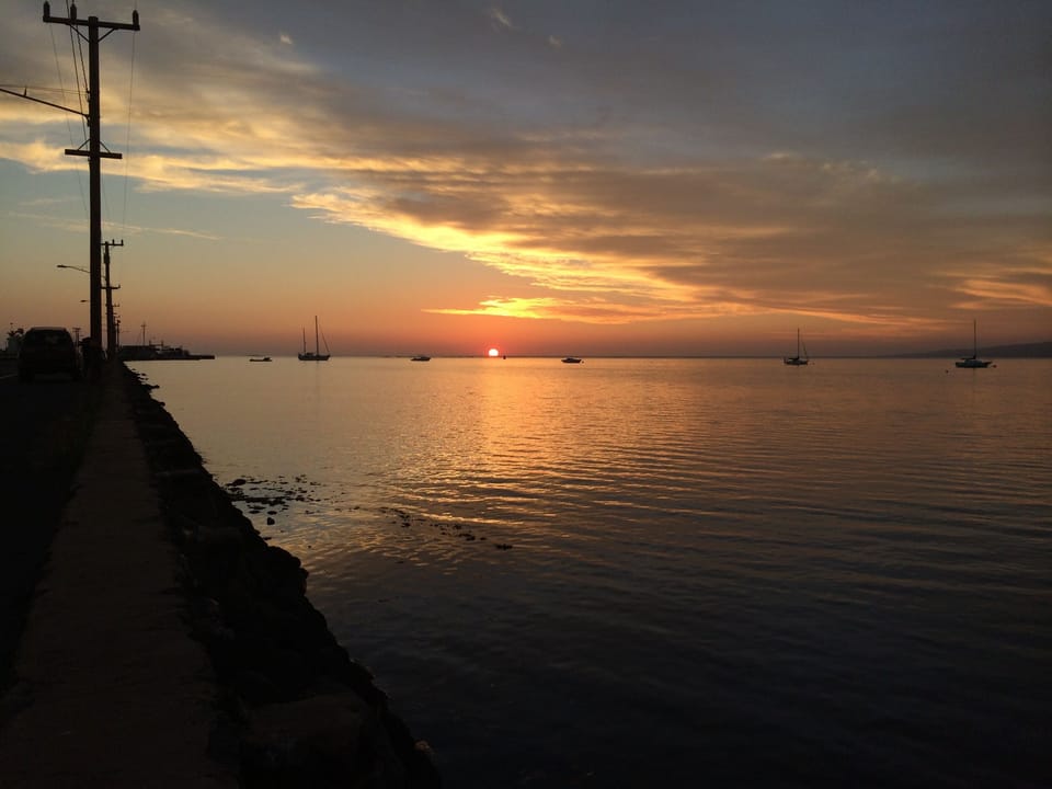 Grab a Maka burger and enjoy a sunset at the pier.