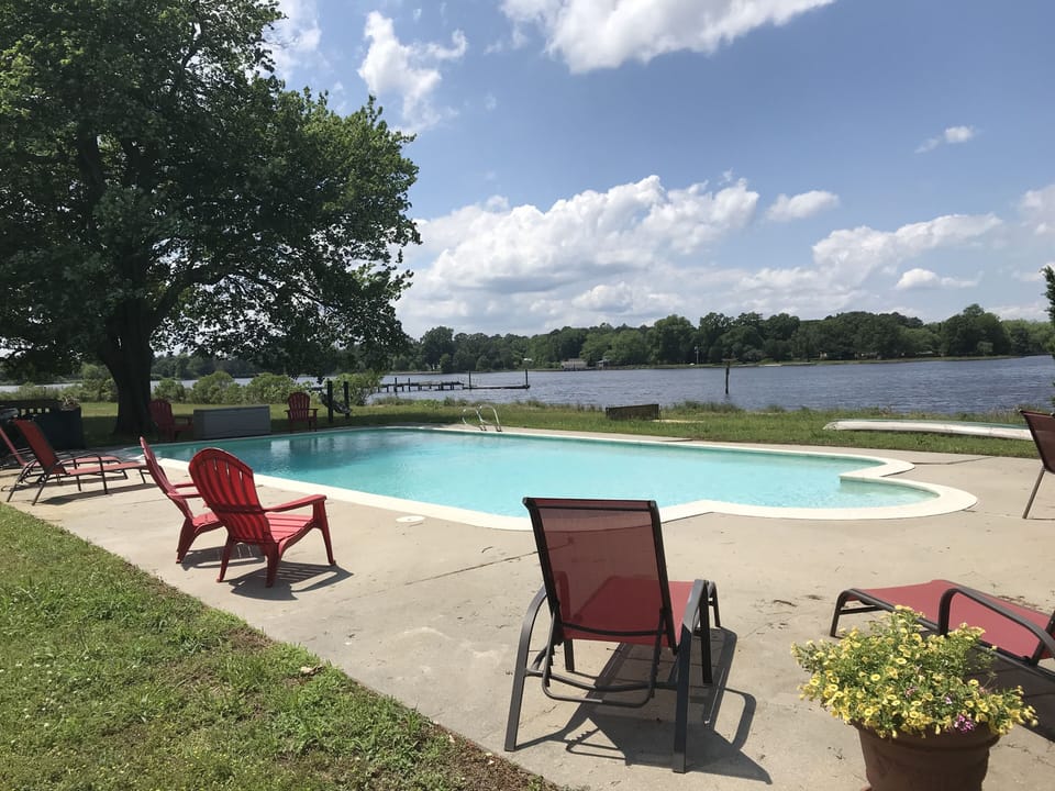 The swimming pool overlooks the river.  Open seasonally from May - September.
