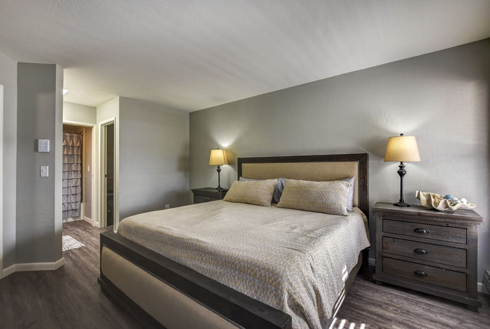 Master Bedroom with walk-in closet, 50" TV, new T&N mattress and full bathroom
