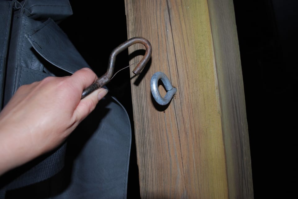 While in use, please fasten hot tub cover to deck using strap provided.