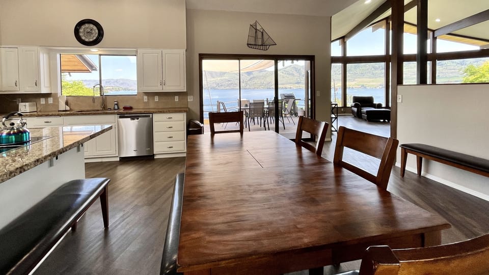 Beautiful views and open spaces, with sliding door opening to the view. Deck has BBQ, outdoor dining area, and hot tub