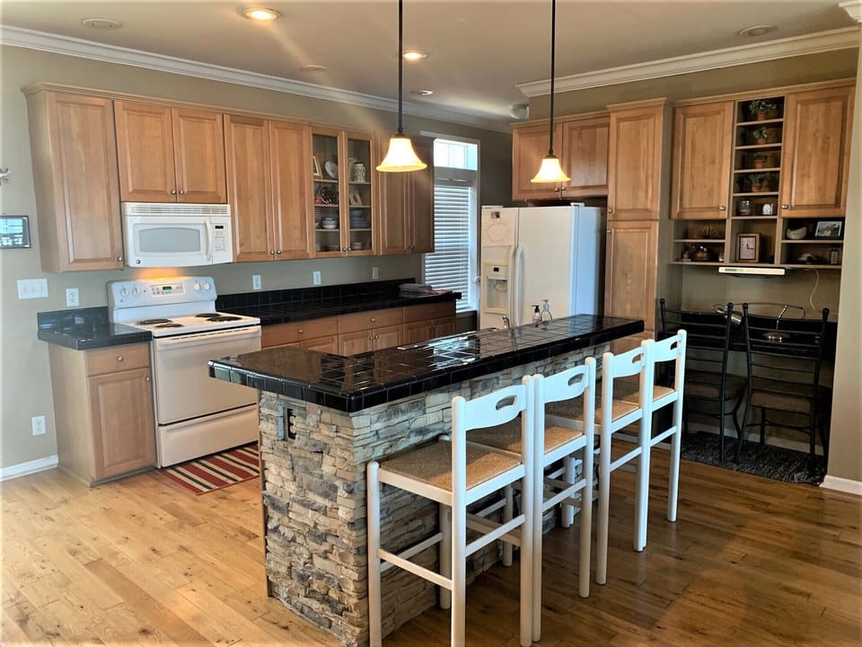 Eat at bar area in addition to a dining table