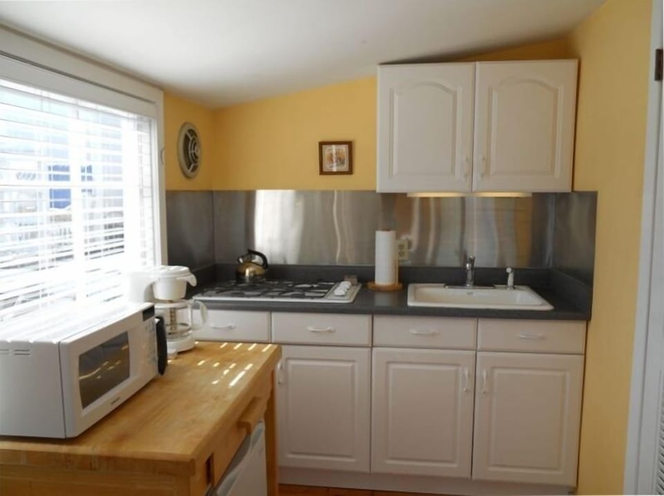 In your galley:  4 burner stove, refridgerator, microwave, toaster, coffee maker