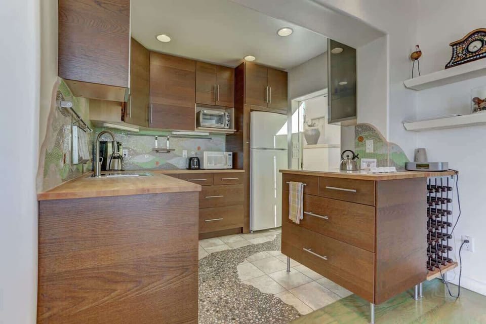 Main room leads into the kitchen.