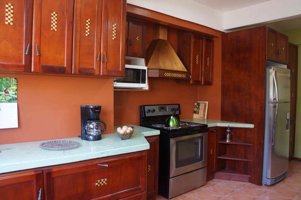 Your kitchen is orderly and equipped. A housekeeper is available for daily hire.