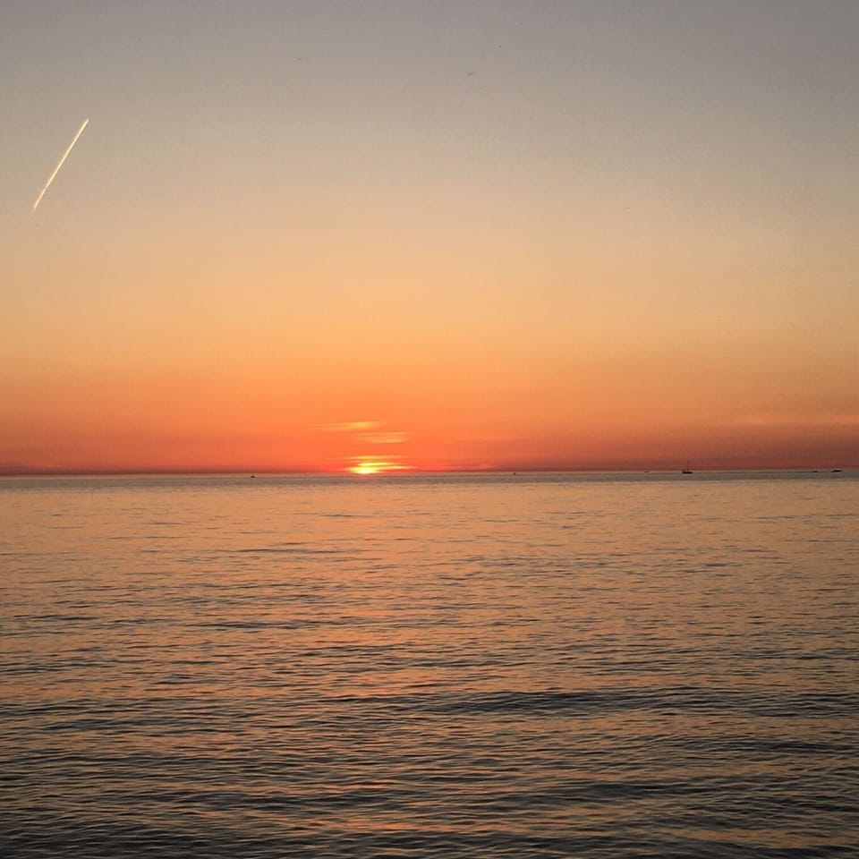 Sunset on the private Lake Michigan beach.