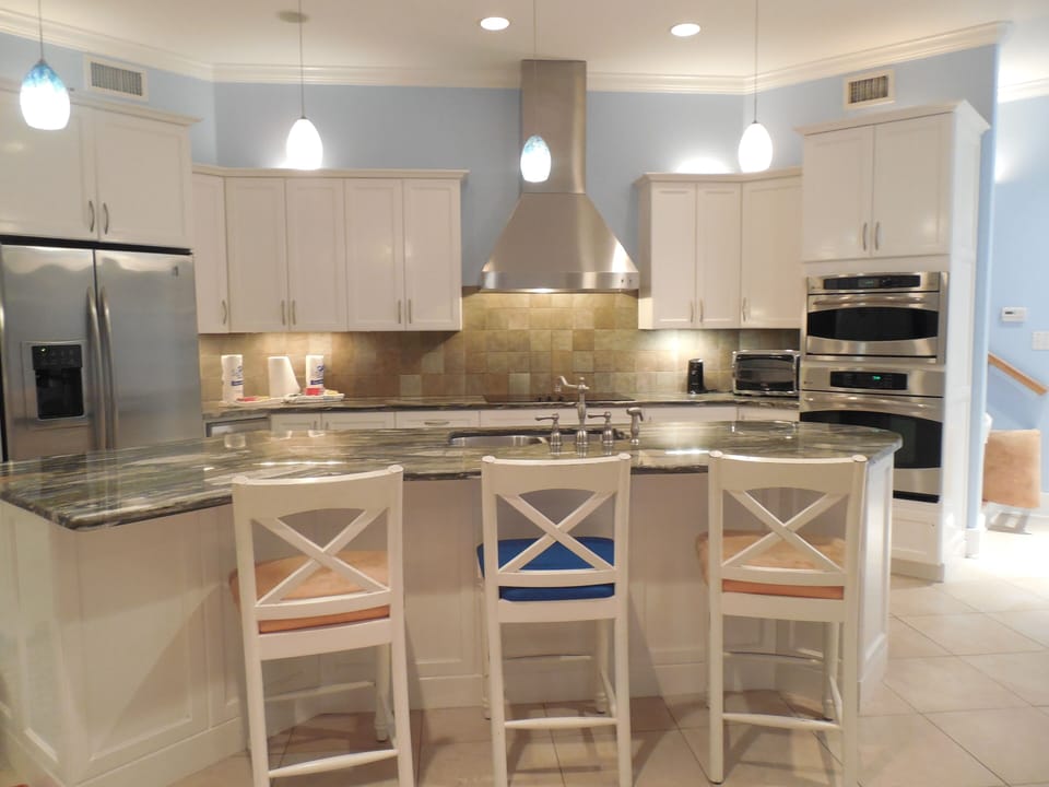 Kitchen has a separate ice maker, 2 dishwashers and a 2nd frig in the utility 