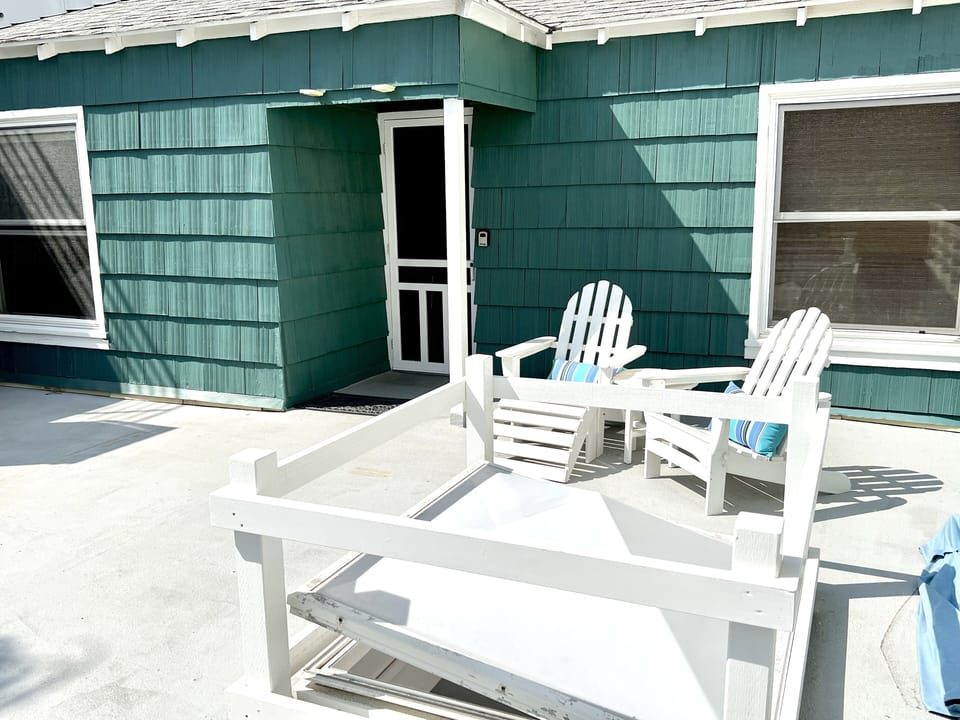 Morning sun on the deck is just right, for coffee.