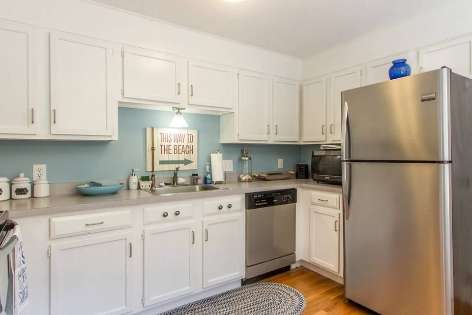Dishwasher, microwave, coffee machine and french press.