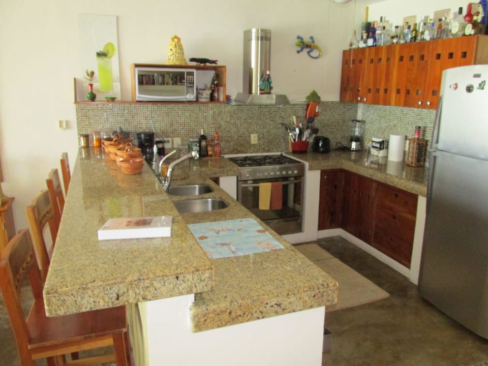 Full kitchen with stainless steel appliances