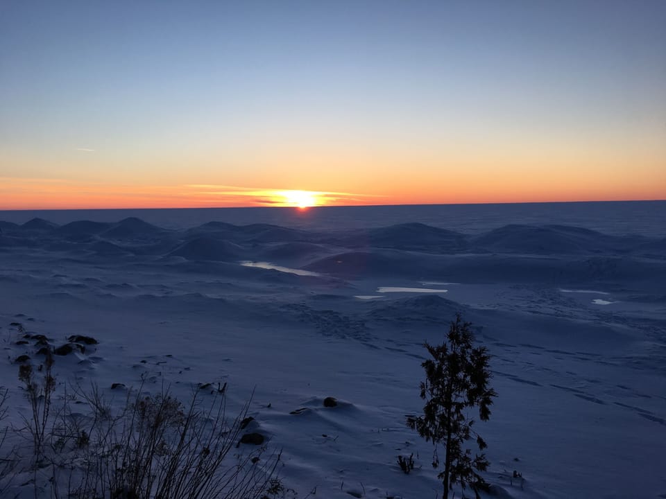 A Beautiful Winter Sunset Over the Frozen Waters of Green Bay from Hidden Harbor