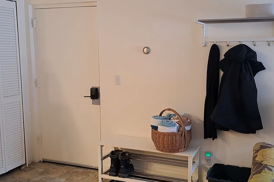 Entry provides a place to remove shoes, boots and coats; gear in closet