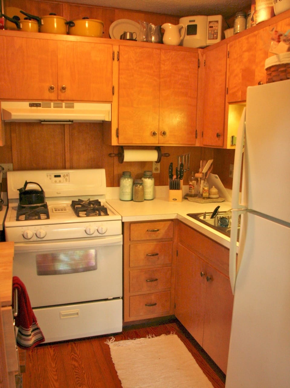 Kitchen has updated appliances and fully stocked utensils