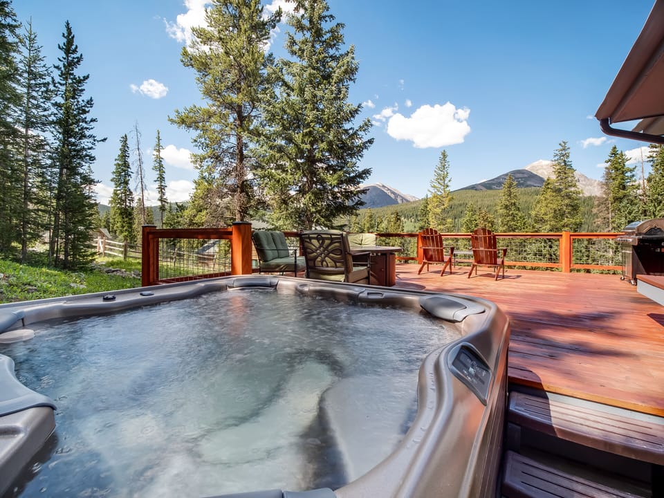 Sit in the hot tub and take in the views.