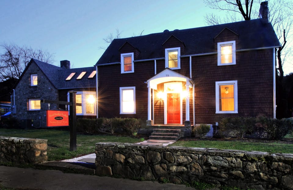 The Red Bridge Lodge at night.
