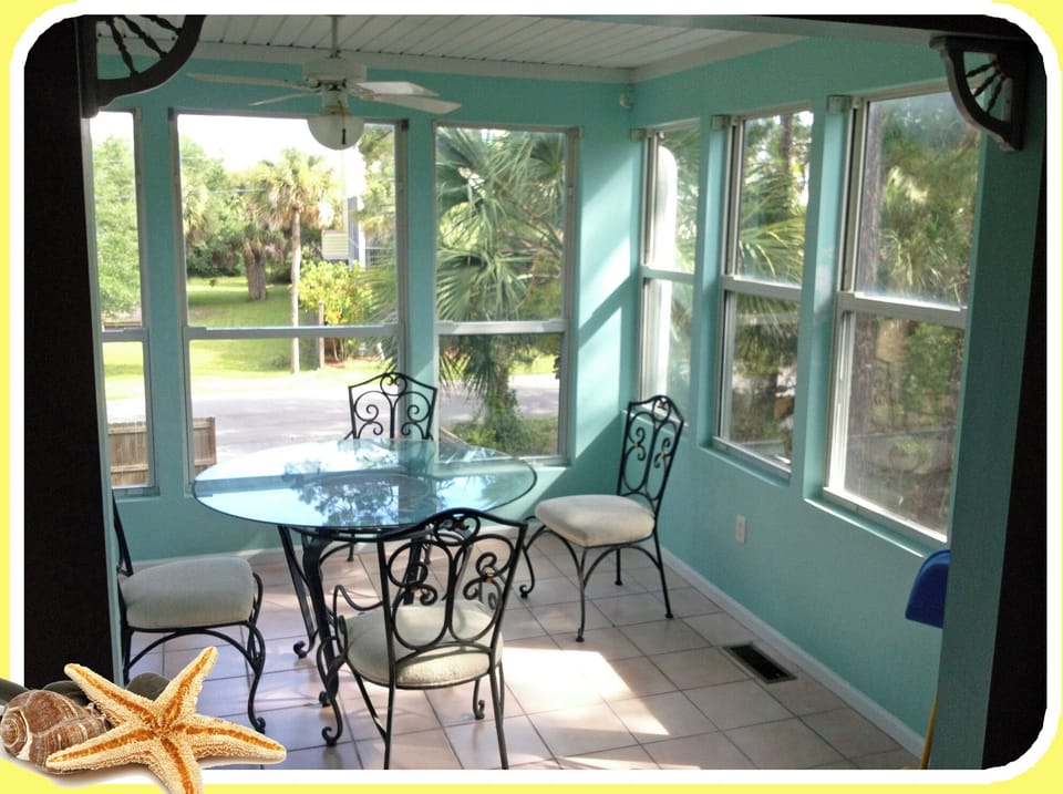 Main floor sun-room connected to the Kitchen