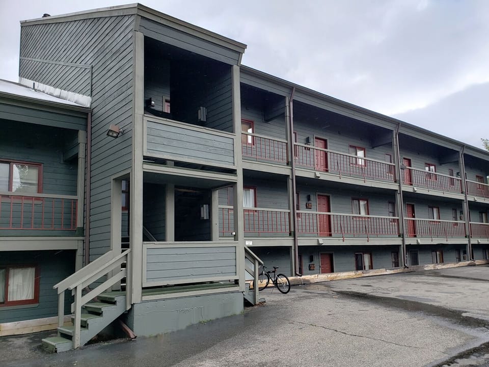 Condo exterior, parking lot side