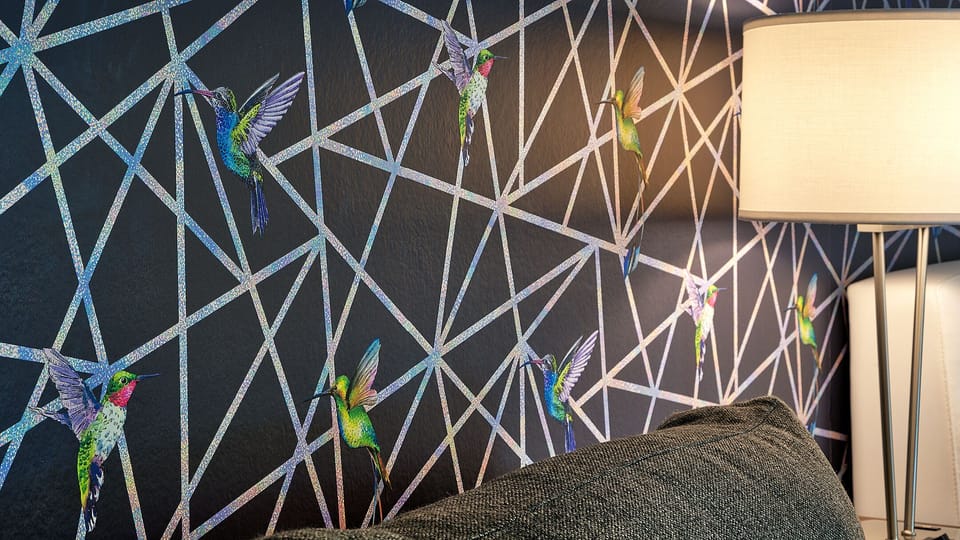 Bed #1- Holographic hummingbird wallpaper. 