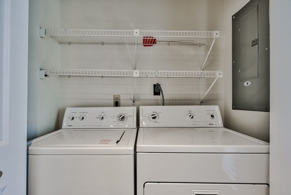 Laundry is in condo in kitchen