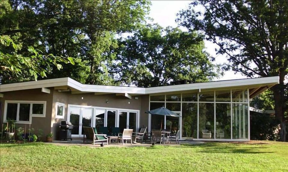 Back of house with patio
