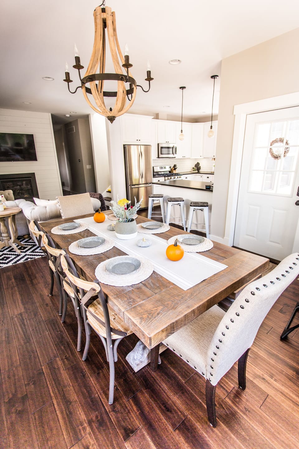 Dining area looking into the kitchen & living area w/55" TV & gas fireplace