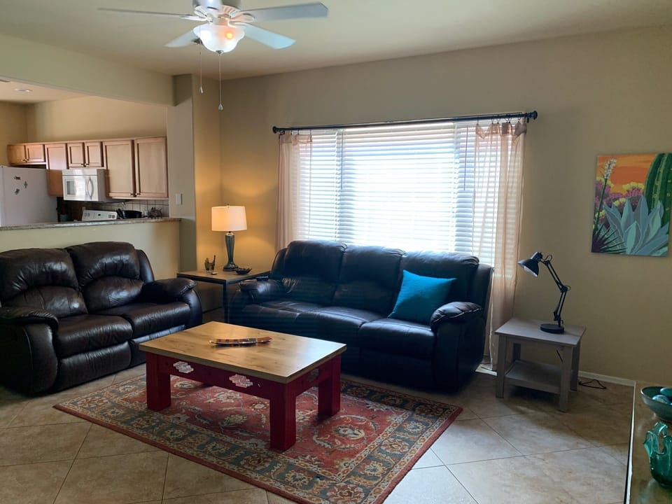The Great Room is nicely connected to the kitchen with a shared half wall.
