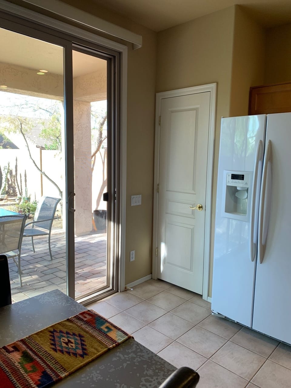 Kitchen leads has expansive patio doors leading to grill, and outdoor dining.