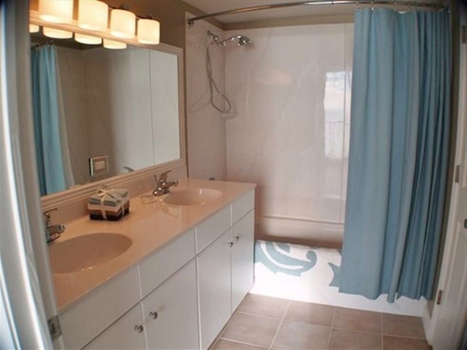 Master Bath: Large tub and shower w/double vanity & shower massage-Framed Mirror