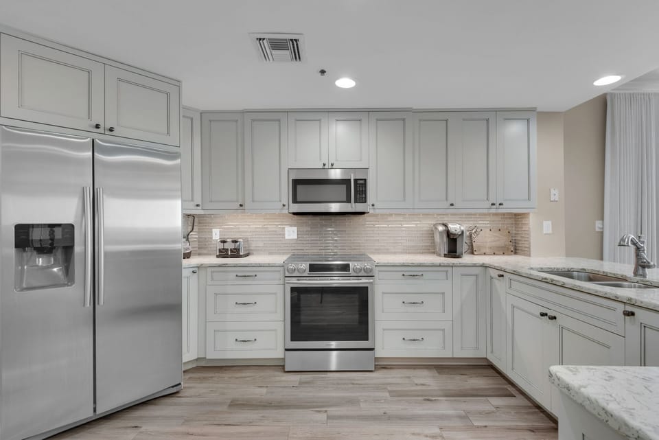 Spacious kitchen with upgraded stainless steel appliances
