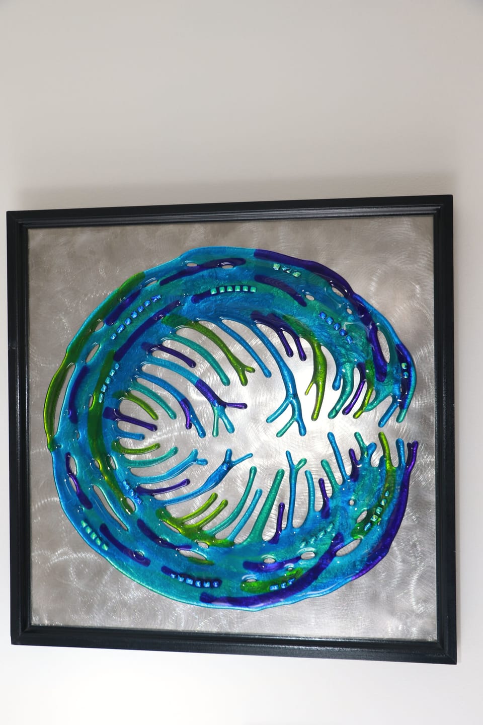 Original fused glass artwork by the owners, Ron and Yolie Strickland.