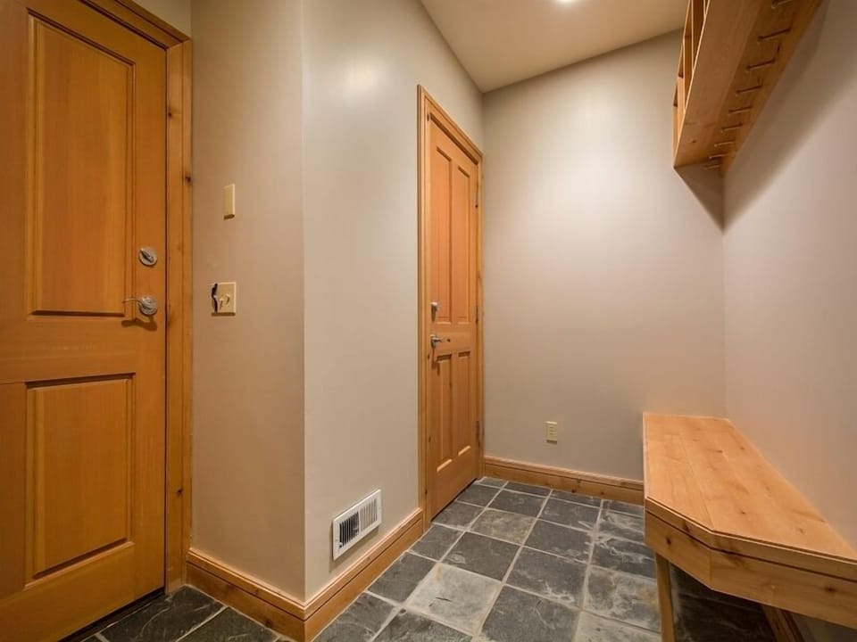 Lower level ski clothes storage, off two car garage